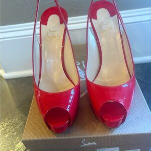 Christian Louboutin Women’s peep toe pumps